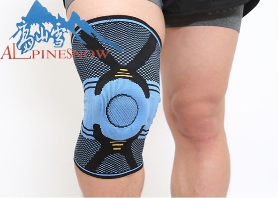 LA CHINE Protection faite sur commande de douille de genou de compression d'accolade de soutien de genou avec l'appui de ressort fournisseur